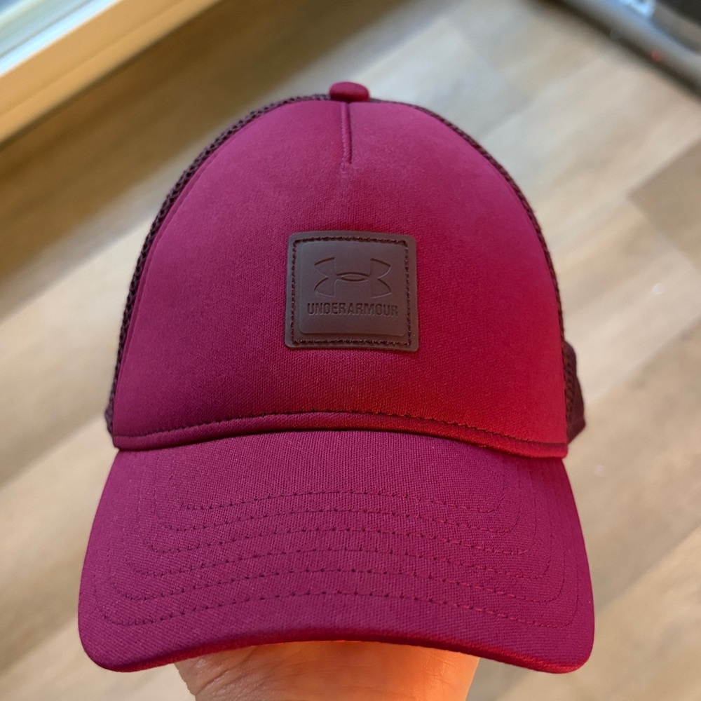 Under Armour woman’s burgundy truckers hat